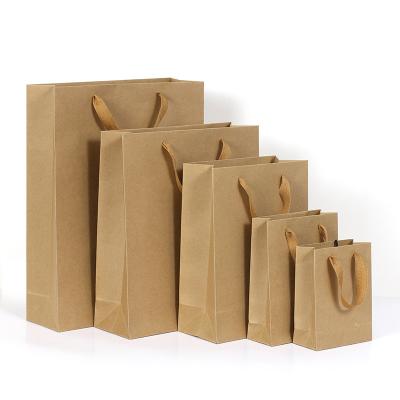 China Recyclable Wholesale Paper Bags With Your Own Logo Food Take Away Brown Craft Paper Bag With Handle for sale