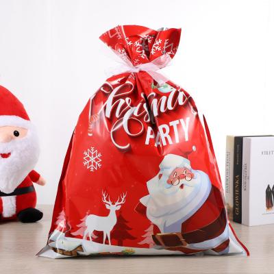 China Christmas Recyclable Christmas Kids Gift Set Red Santa Candy Apple Cookie Christmas Candy Bags for sale