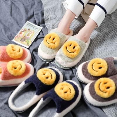 China Home Lovers Fluffy Smiley Face Happy Sale Ladies Slippers Fashion Trend Cartoon Cotton Casual Popular Cute Warm Plush for sale