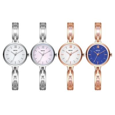 China Women New Products Bezel Stones Pink Or Blue Single Dial Stainless Steel Watch With Roma Number for sale