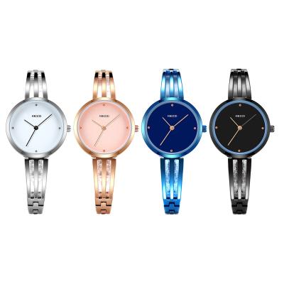 China Luxury Popular Girl Three Small Hands Simple Blue Peacock Strap Hollow-out Ladies Dress Watch for sale