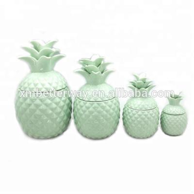 China Sustainable Home Storage Light Green Pineapple Ceramic Jar With Lid for sale