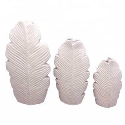 China Modern Unique Banana Leaf Shaped Modern Design Ceramic Vase For Home Decor for sale