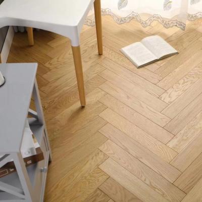 China New Modern Type 12mm Piso Herringbone Floating 8mm Laminate Flooring for sale