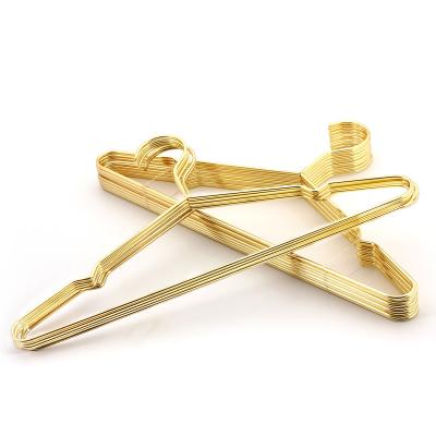 China Minimalist Metallic High Quality Cloth Drying Metal Rose Gold Clothes Hanger for sale