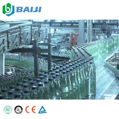 China Mineral Water Automatic Bottle Filling Beverage Glass Bottle Bottling Machine for sale