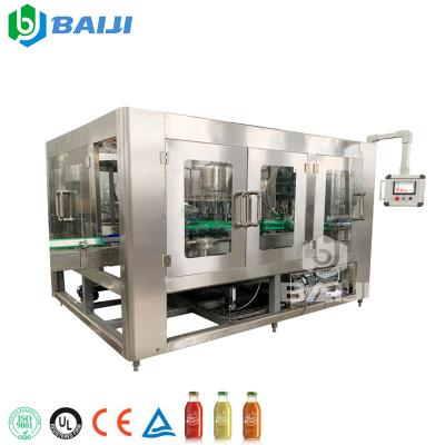 China Full Automatic Food Glass Bottle Concentrate Fruit Juice Drink Making Filling Capping Packing Machine Production Line for sale