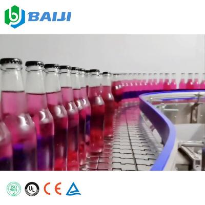 China Automatic Beverage Glass Bottle Gas Beverage Filling Machine / Carbonated Soft Drink Making Equipment for sale