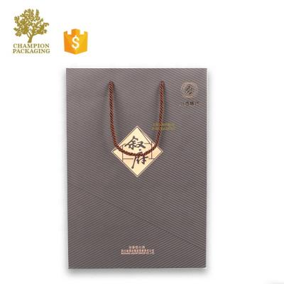 China Recyclable Custom Logo Print Shopping Paper Bag Clothing Shoe Packaging Gift Cheap Washable Paper Bag for sale