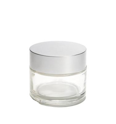 China Freshness Preservation Transparent Cosmetic Glass Jar With Rose Gold Aluminum Lid for sale