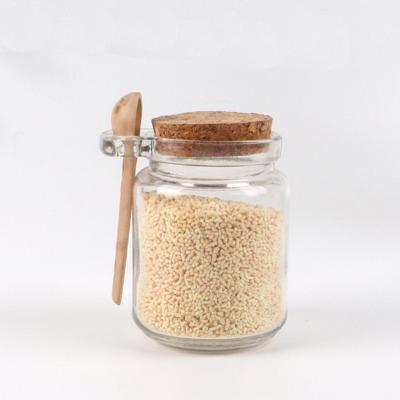 China Eco-friendly Glass Spice Storage Food Freshness Preservation Kitchen Glass Jar with Bamboo Spoon and Press Lid for sale