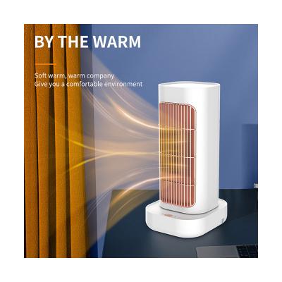 China Wind power: 2 gears Smart Adjust Head Shaking 1300W Heater New Design Temperature fan portable mini room PTC ceramic electric heater for sale