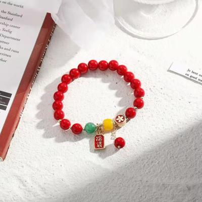 China TRENDY simple wild natural stone red topaz bead string hand spiky tassel bracelet for sale