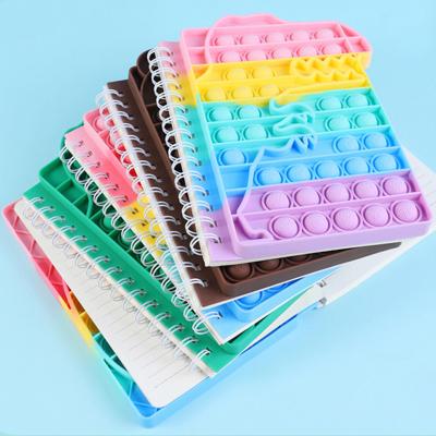 China Topsthink Recyclable Wholesale Pop Push Silicone Spiral Snap Bubble Diary Journal Notebook For Kids for sale