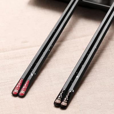 China 1 Pair Disposable Black Chopsticks Adversarial Travel Chopstick Rest Chinese Japanese Sushi Fruit Holder Korean Kitchen Tableware for sale