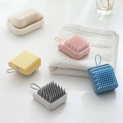 China Sustainable Durable Rubber Pet Grooming Brush Soothing Massage Pet Shampoo Soft Rubber Bath Brush Comb for Dogs and Cats for sale