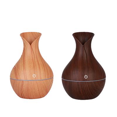 China Household 130ml USB Aroma Essential Oil Electric Ultrasonic Air Diffuser Humidifier Seven Colors Wooden Grain Led Lights Aroma Humidifier for sale