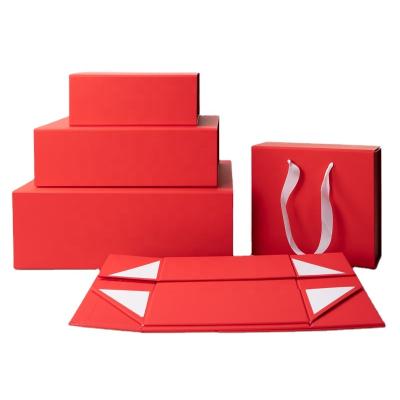 China Recycled Materials Custom Coated Paper Luxury Magnetic Foldable Cardboard Red Christmas Gift Box for sale