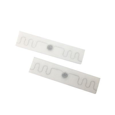 China Fabric RFID Uhf Laundry Tag 20*86mm Machine Washable RFID Tags for sale