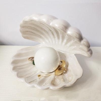 China Ceramic Enamel Fashionable Ceramic Decorative Gift Small Bedside LED Pearl Shell Table Lamp Night Lamp Bedroom Living Room Jewelry Box for sale