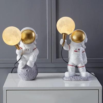 China New EUROPEAN table light astronaut home decorate bedroom bedside lamp reading modern astronaut lamp for sale