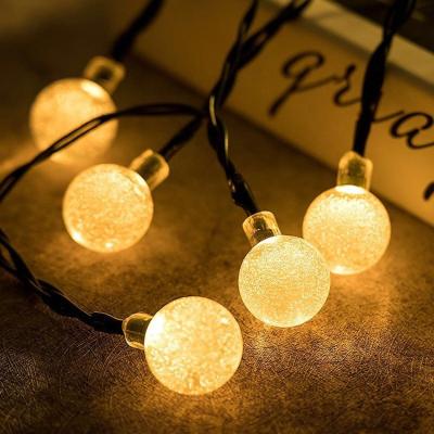 China Residential Style Solar Panel 30LED Foam Bulb String Christmas Lights Warm Holiday Lights Outdoor Patio Decorative Lights 8 Mode for sale