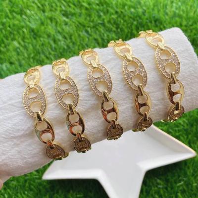 China FASHIONABLE Zircon Gold Color Plated Pig Nose Coffee Bean Open Cuff Bangle For Wrist Wear for sale