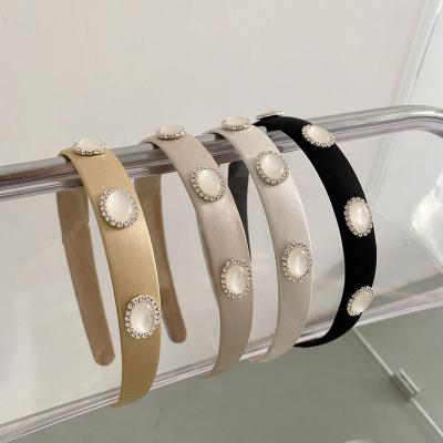 China 2022 New Fashion Trend Women's Diamond Hair Bands Pearl Crystal Headbands for sale