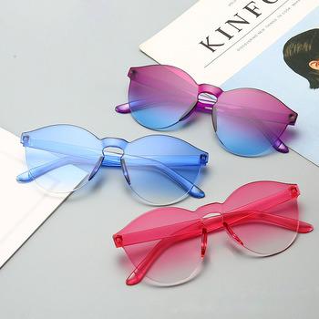 China Trendy Women's Rimless Sunglasses Transparent Ladies Candy Color Fashion Sun Glasses for sale