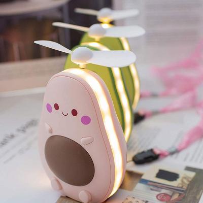 China Cute Avocado USB Fill Light +Mirror +Fan Charging Portable Mini Fan Lady LED Fill Light Makeup Mirror Handheld Fan for sale