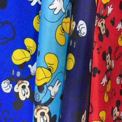 China Cartoon Printed Waterproof Mickey Polyester Oxford Fabric For School Bag for sale