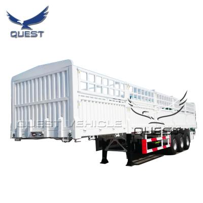 China Truck Trailer 3 Axles 50ton 60 Ton Flat Bed Semi Trailer , Stake Barrier Cargo Semi Trailer With Detachable Sides for sale