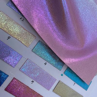 China New Style Designer Fabric Faux Leather Waterproof Soft Fabric Vinyl Glitter Holographic Transparent Leather for sale