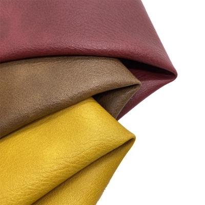 China Double color waterproof brushed pvc leather in roll suni deri pvc leather upholstery fabric for bag for sale