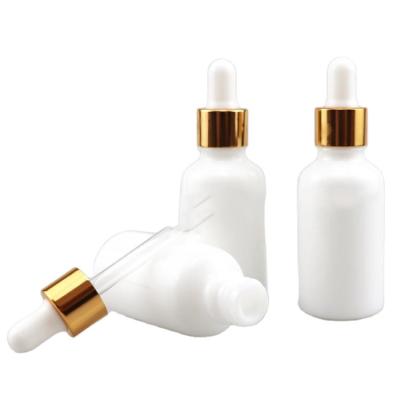 China Various Types Empty Matte White CBD Oil Bottle Glass Dropper Personal Care Glass Bottles for sale