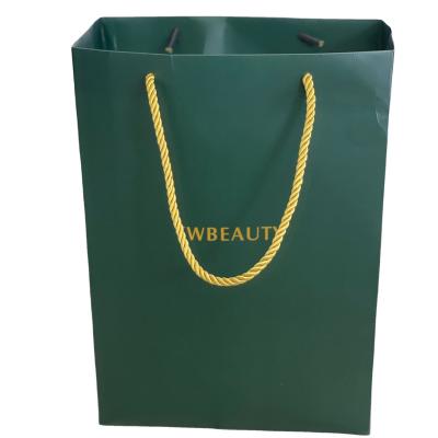 China Recyclable 250g Shopping Bag Paper With Customize Logo And Gold String for sale