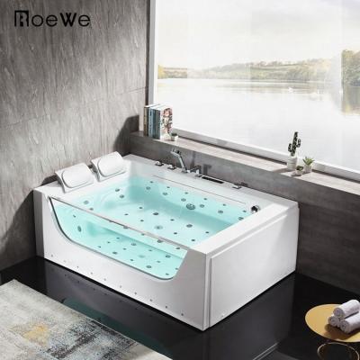 China Double Side Skirt (Left Skirt) 2 Person Hot Tub With Led Hydromassage Waterfall Large Clear Glass Bathtub Lightweight White Acrylic Whirlpool Bathtubs for sale