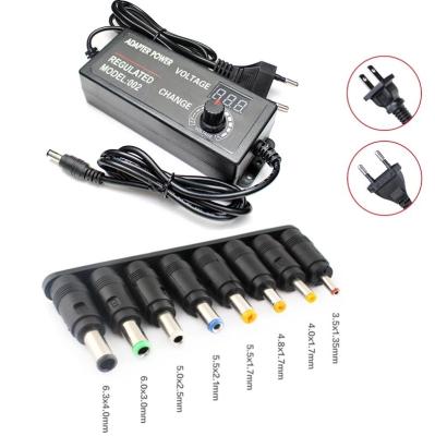 China DC to AC 3V-24V 3A Adjustable Voltage Power Supply Universal Adapter with 8 Plug N-2403 Connectors for sale