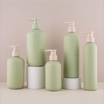 China Low MOQ Cosmetic Green Plastic Natural Cosmetic Set Shampoo And Conditioner Set Lotion Pump Cream Shampoo Bottles for sale