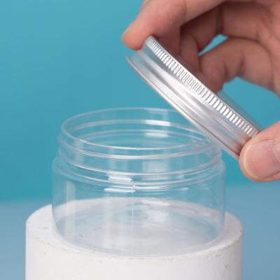 China Cosmetic In Stock Unique Luxury Transparent 2oz Round Wide-mouth PET Cosmetic Plastic Jars With Lid for sale