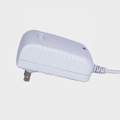 China UniversalÂ   DC to AC Adapter 5V 12V 24V 0.5A 1A 1.5A 2A Compression Adapter for sale