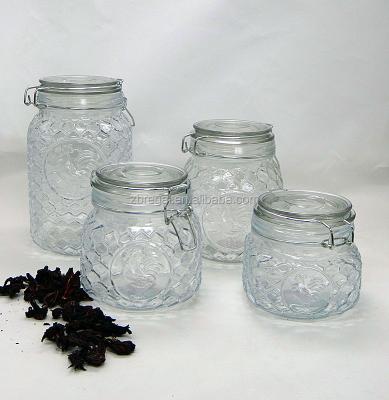 China Sustainable Round Clear Glass Airtight Canisters With Locking Clamps And Embossed Cock for sale