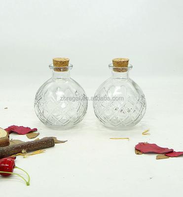 China Viable Spherical Clear Glass Bottle, Round Bottle with Wooden Cork Lid for sale