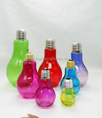 China Sustainable Different Colored Bulb Shaped Beverage Spice Bottle Glass Jar With Metal Lid for sale