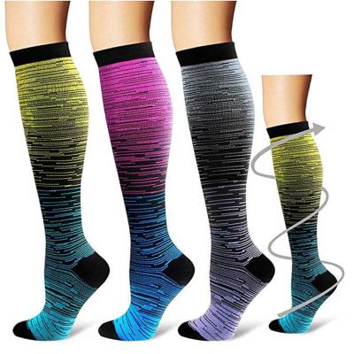 China Viable Wholesale Gradient Pressure Socks For Men And Women In Sports Nylon Socks for sale