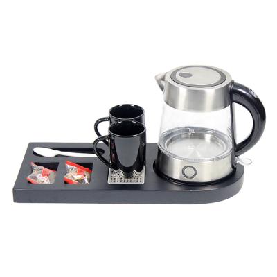 China 360 Degree Rotating Home Use 304 Stainless Steel Heating Plate Low Electric Glass Kettle Set for sale