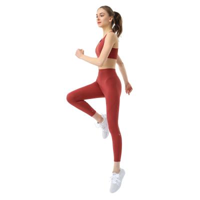 China Wholesale Manufacture High Stretch Women's Yoga Fitness Set Breathable Leggings And Sports Bra Yoga Set for sale