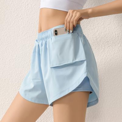 China Clothing Breathable Yoga Workout Women Short Pants Loose Fitness Running Shorts With Pockets Gym Sports Shorts for sale