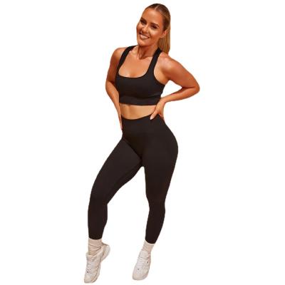 China Newly Breathable Seamless Yoga Gym Leggings 2 Pieces Set Workout Sports Bra Leggings Yoga Sleeveless Set for sale