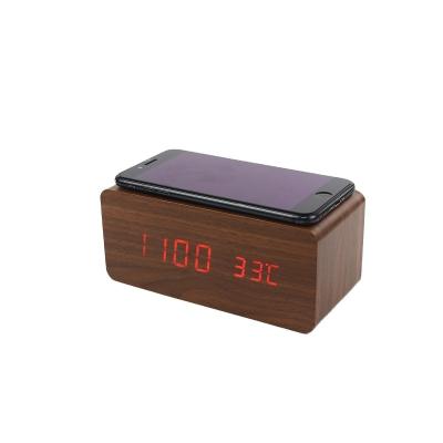 China Charging Board QUICK Charging Alarm Clock Voice Control Pad Qi Charger Electric Vehicle Wooden Wireless Charger Phone Radio Alarm Clock for sale